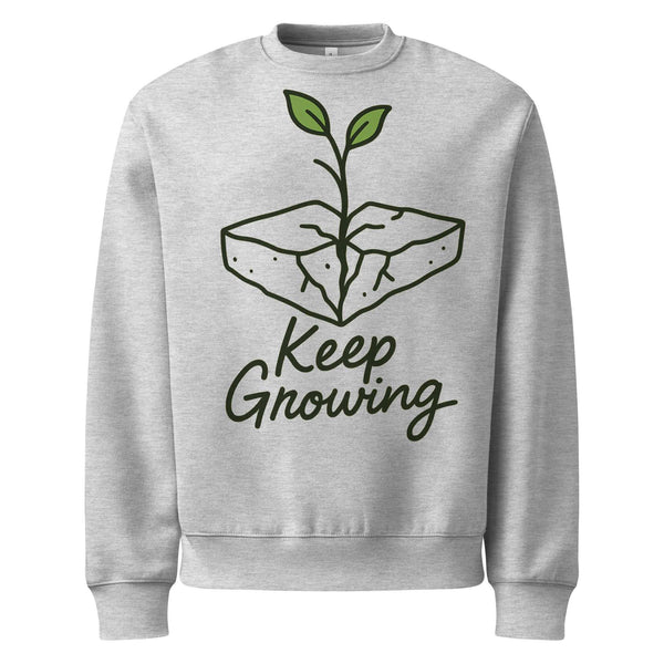 Gray sweatshirt with 'Keep Growing' graphic design on a white background